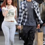 Jemma Lucy in a Grey Sweatpants Was Seen Out with Mitch Palmer in Oxford Street in London