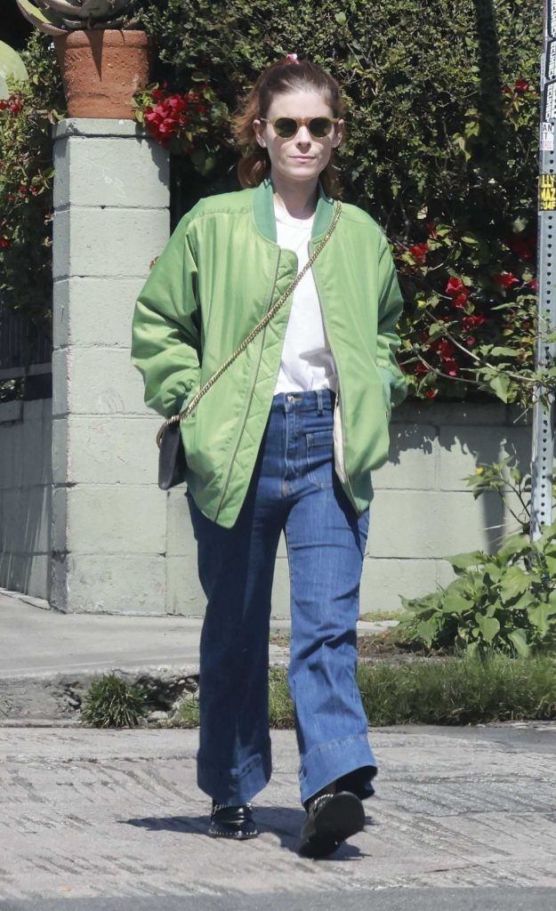 Kate Mara in a Green Jacket