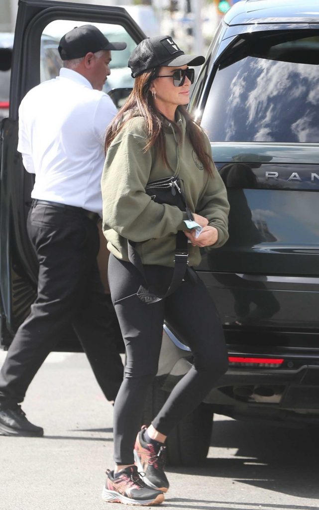 Kyle Richards in a Black Cap