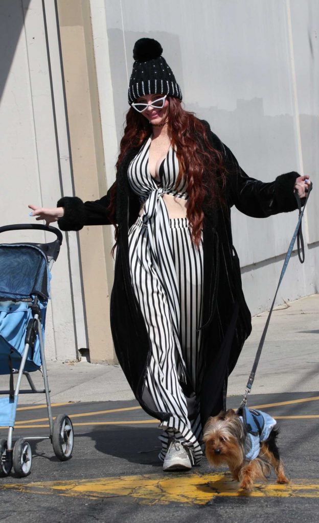 Phoebe Price in a Black and White Striped Ensemble