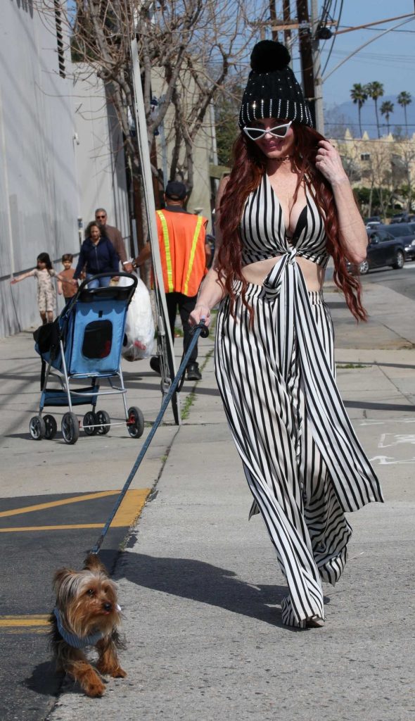 Phoebe Price in a Black and White Striped Ensemble
