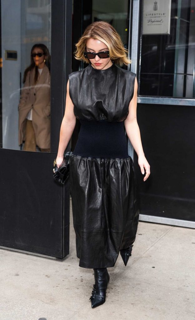 Sydney Sweeney in a Black Leather Dress