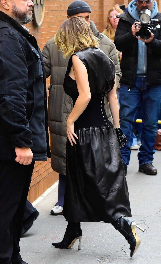 Sydney Sweeney in a Black Leather Dress