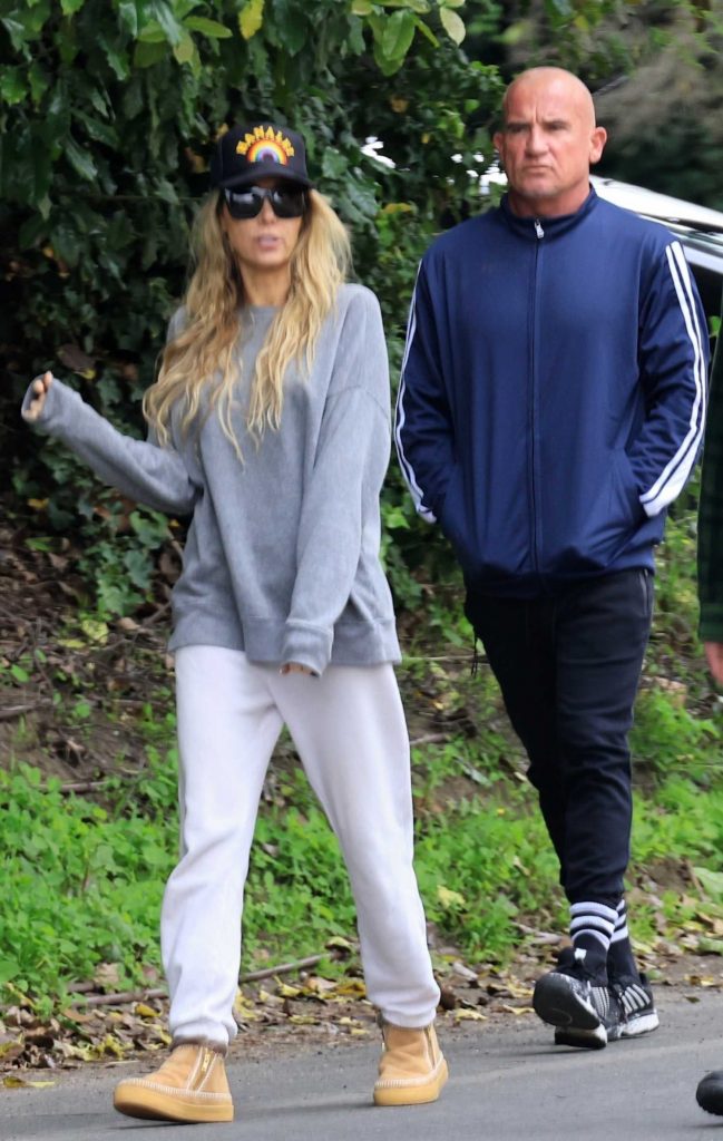 Tish Cyrus in a Grey Sweatshirt