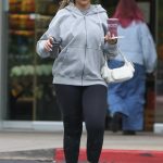Jordyn Woods in a White Sneakers Made a Quick Pit Stop at Erewhon in Calabasas