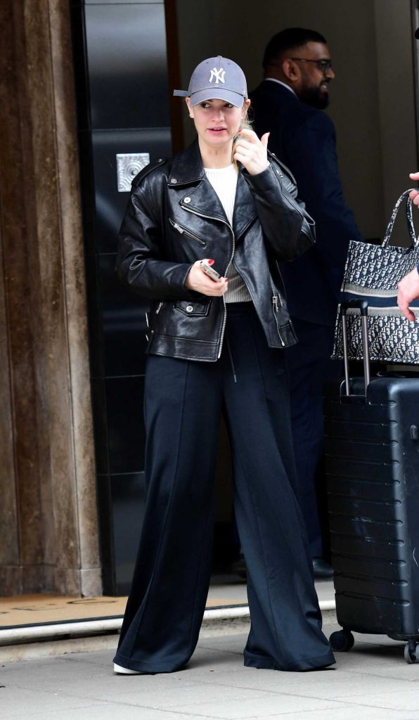 Lily James in a Black Leather Jacket