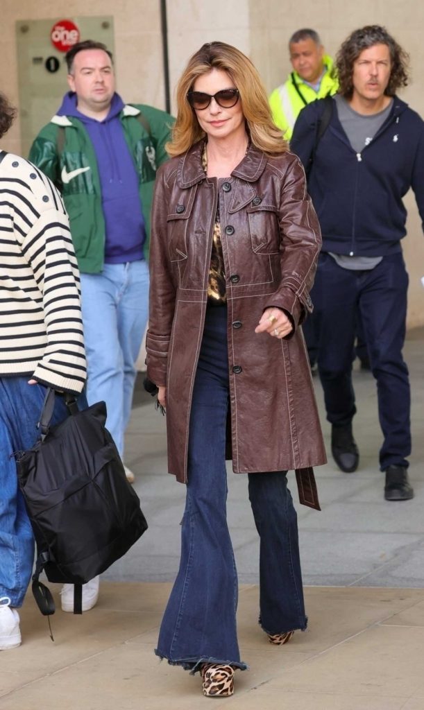 Shania Twain in a Brown Leather Coat