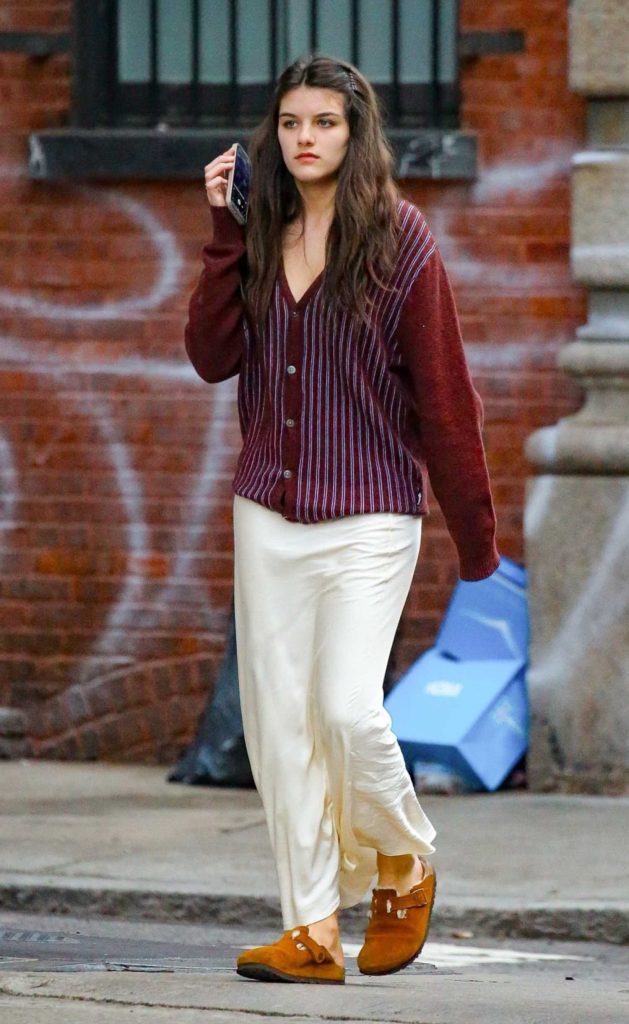 Suri Cruise in a White Skirt