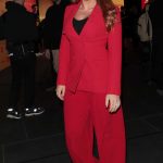 Tallia Storm in a Red Pantsuit Arrives at the McDonald’s Launch Party at Outernet in London