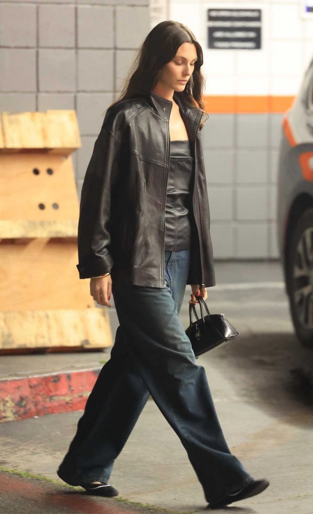 Victoria Ceretti in a Black Leather Jacket