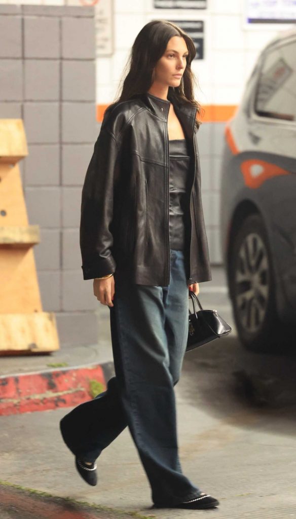 Victoria Ceretti in a Black Leather Jacket
