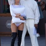 Bianca Censori in a White Catsuit Arrives at Florence Airport with Kanye West in Florence