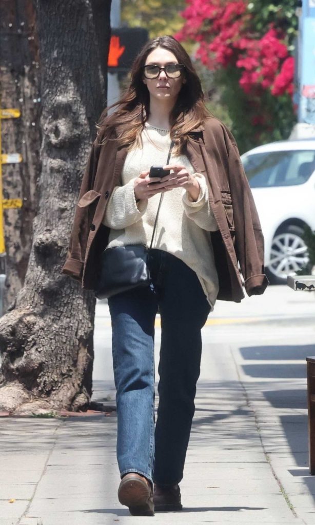 Elizabeth Olsen in a Brown Jacket