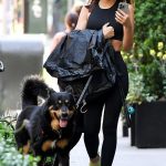 Emily Ratajkowski in a Black Top Takes Her Dog for a Walk in New York