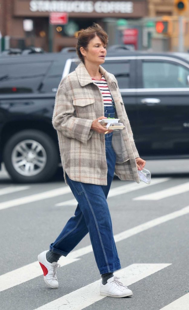 Helena Christensen in a Grey Plaid Jacket