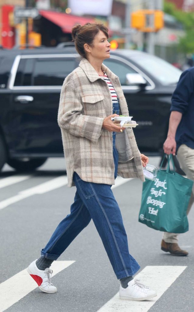 Helena Christensen in a Grey Plaid Jacket