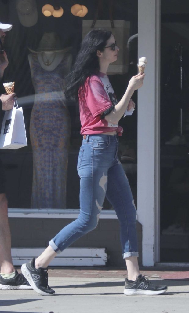 Krysten Ritter in a Black Sneakers