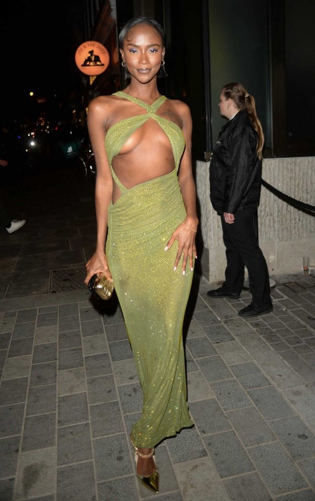 Riley Montana in an Olive Dress