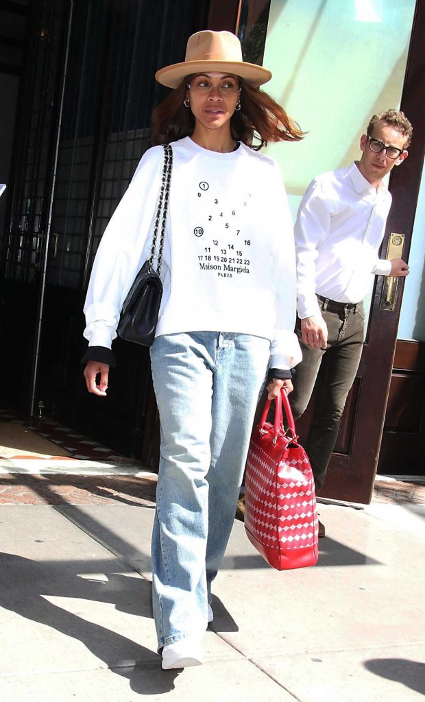 Zoe Saldana in a White Sweatshirt