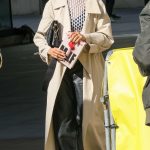 Alesha Dixon in a Beige Trench Coat Was Seen Carrying Paloma Faith Book in London