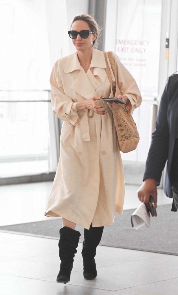 Angelina Jolie in a Beige Trench Coat