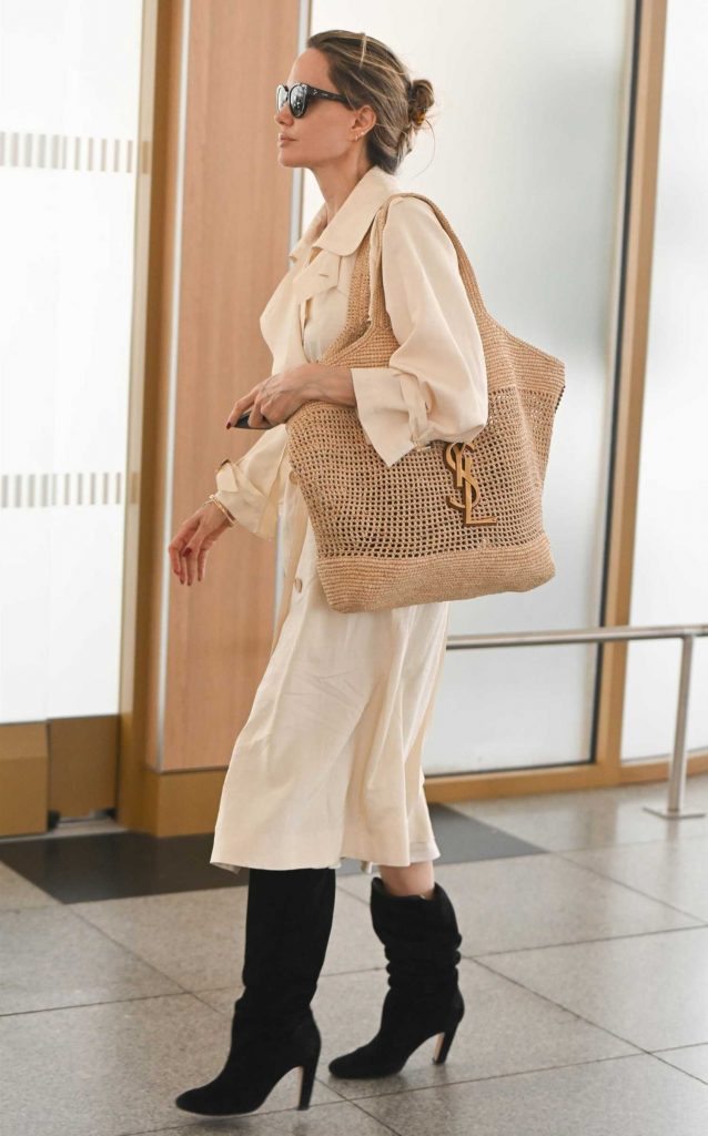 Angelina Jolie in a Beige Trench Coat