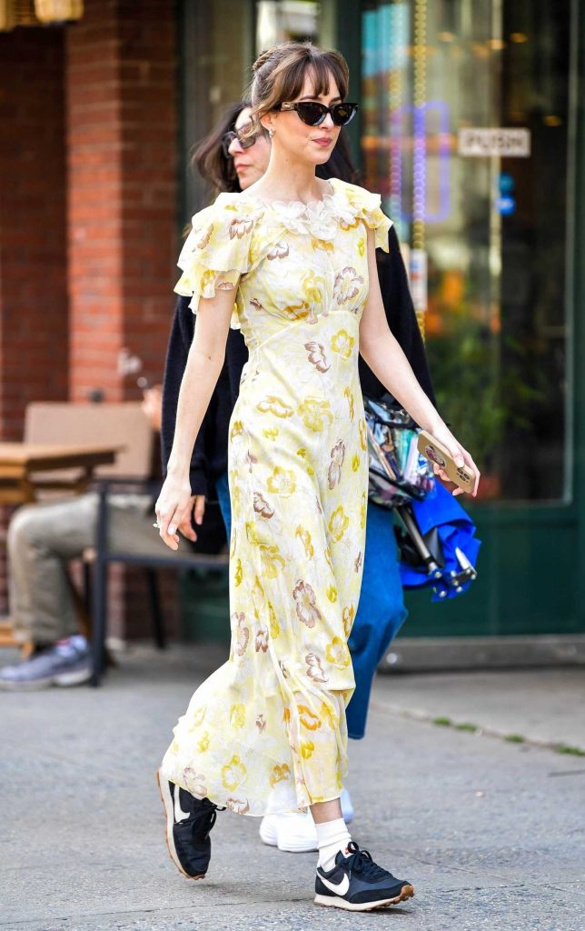 Dakota Johnson in a Yellow Floral Dress