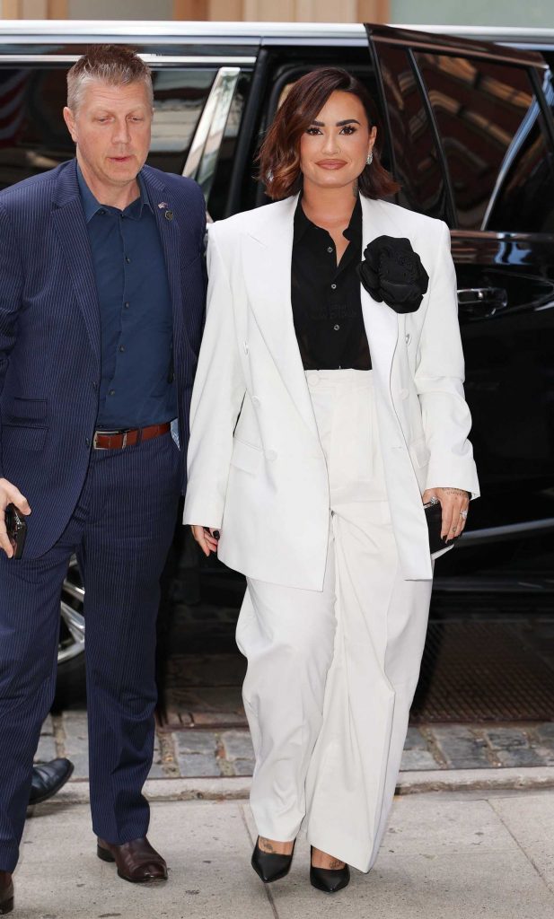 Demi Lovato in a White Pantsuit