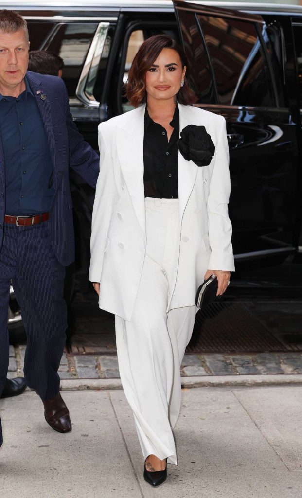 Demi Lovato in a White Pantsuit