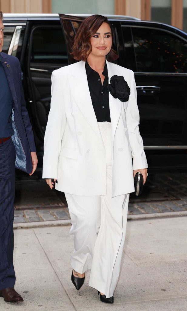 Demi Lovato in a White Pantsuit