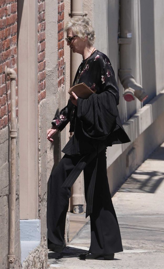 Jane Lynch in a Black Floral Blouse