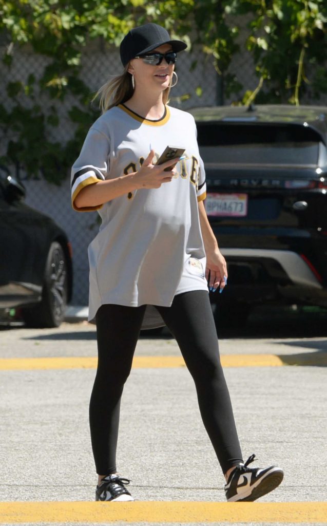 Lala Kent in a Black Cap