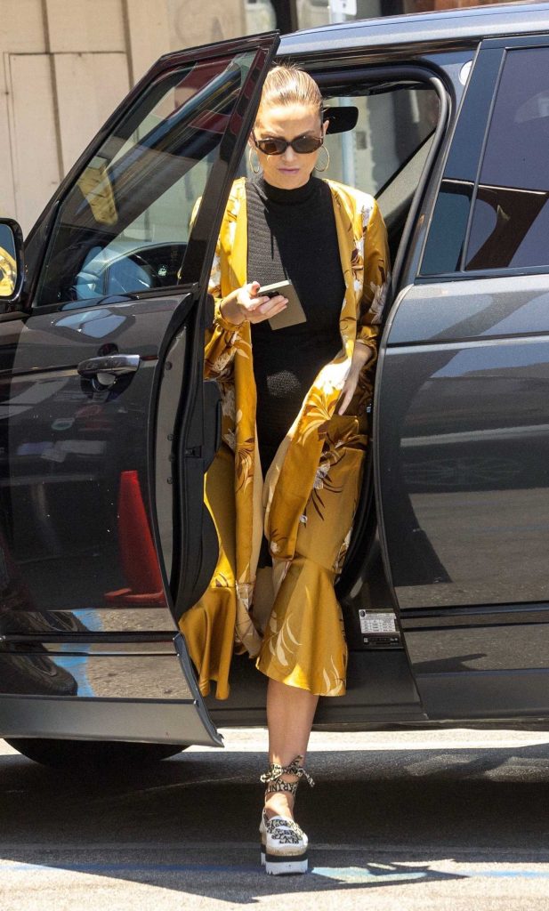 Lala Kent in a Yellow Cardigan