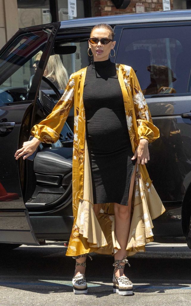 Lala Kent in a Yellow Cardigan