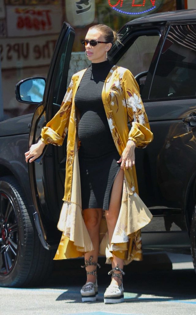 Lala Kent in a Yellow Cardigan