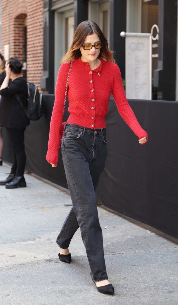 Louisa Jacobson in a Red Cardigan