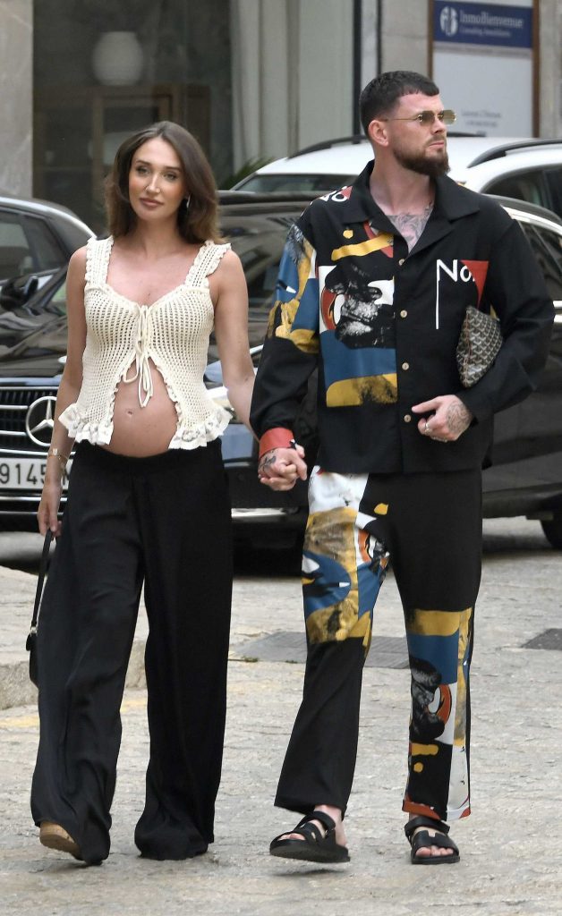 Megan Mckenna in a Beige Blouse