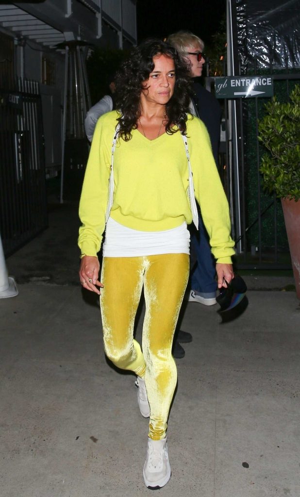 Michelle Rodriguez in a Yellow Jumper