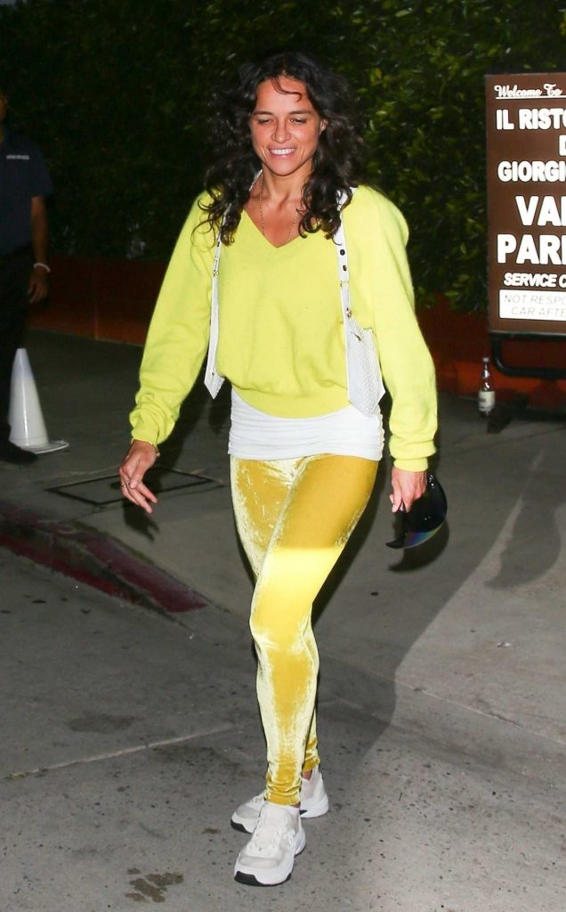 Michelle Rodriguez in a Yellow Jumper