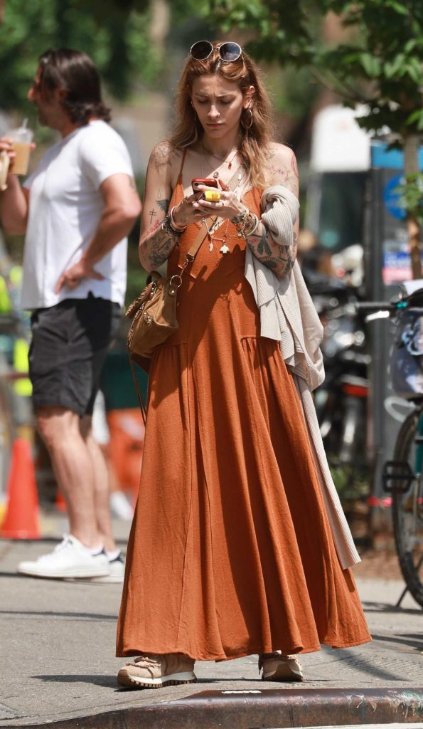 Paris Jackson in an Orange Dress