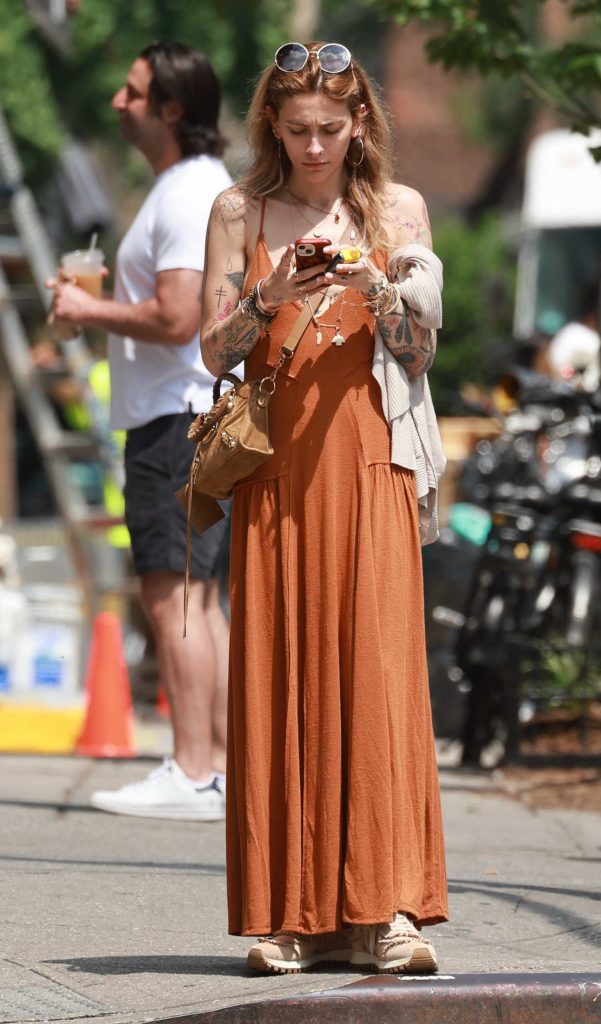 Paris Jackson in an Orange Dress