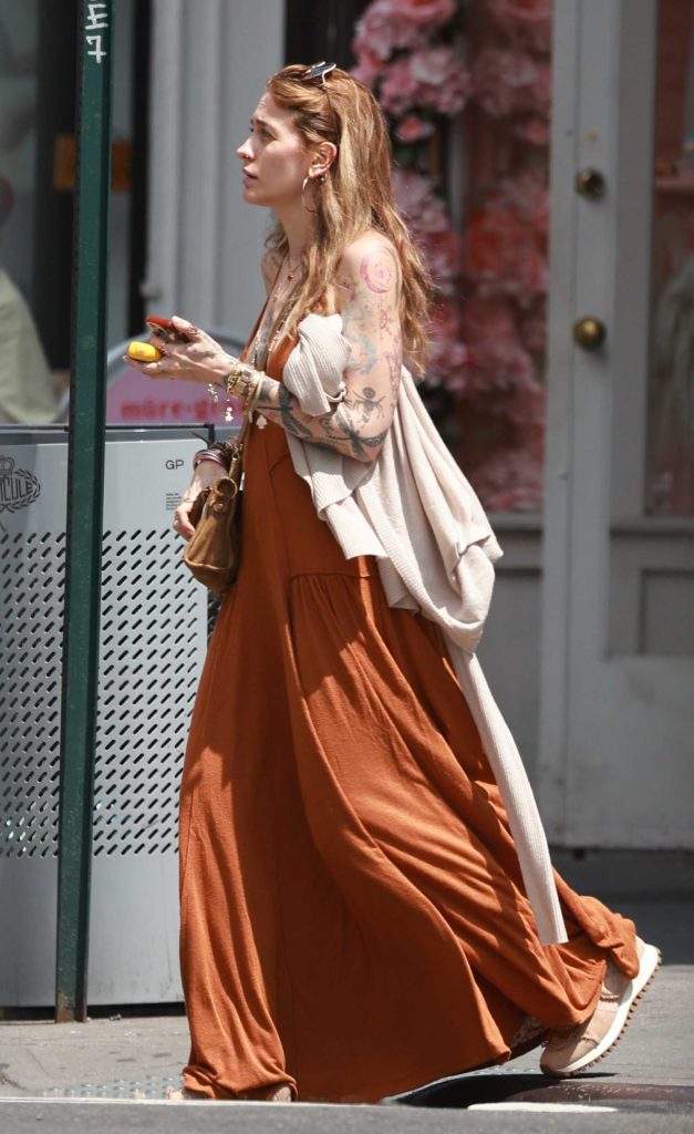 Paris Jackson in an Orange Dress