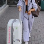 Samantha Kenny in a Grey Sweatsuit Arrives Back in Liverpool