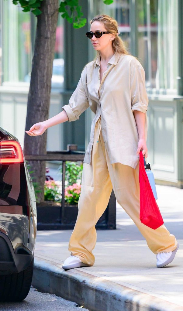 Jennifer Lawrence in a Beige Shirt