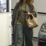 Jessica Alba in an Olive Pants Checks Her Phone in Los Angeles