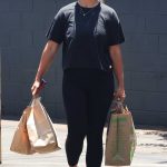 Khatira Rafiqzada in a Black Tee Goes Shopping at a Meat Market in Los Feliz