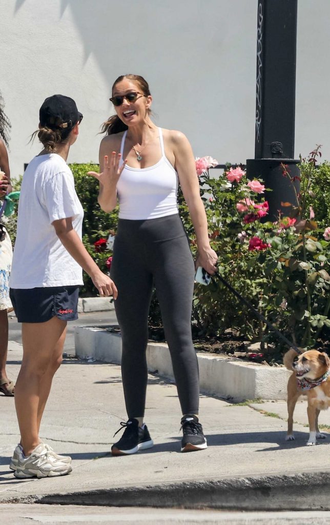 Minka Kelly in a Black Sneakers