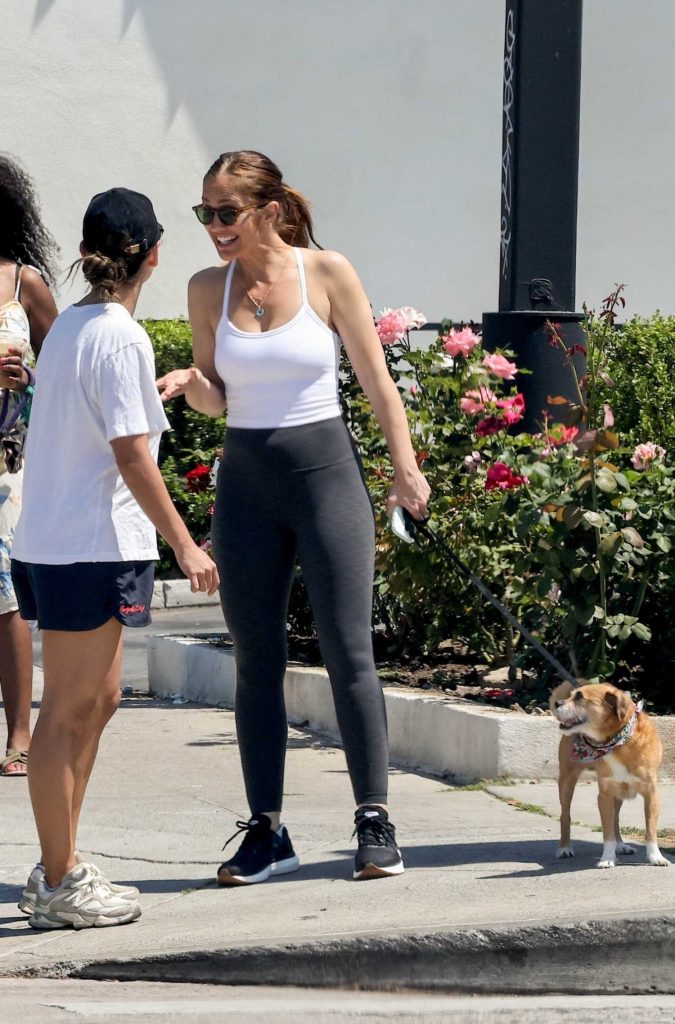 Minka Kelly in a Black Sneakers