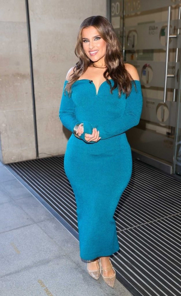 Nelly Furtado in a Tight Turquoise Dress