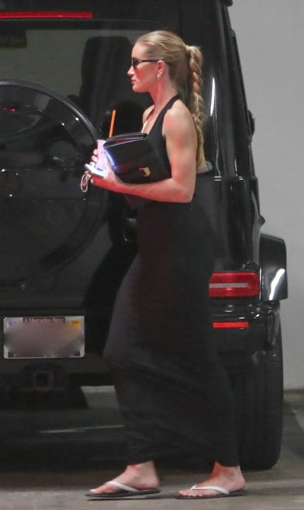 Rosie Huntington-Whiteley in a Black Dress